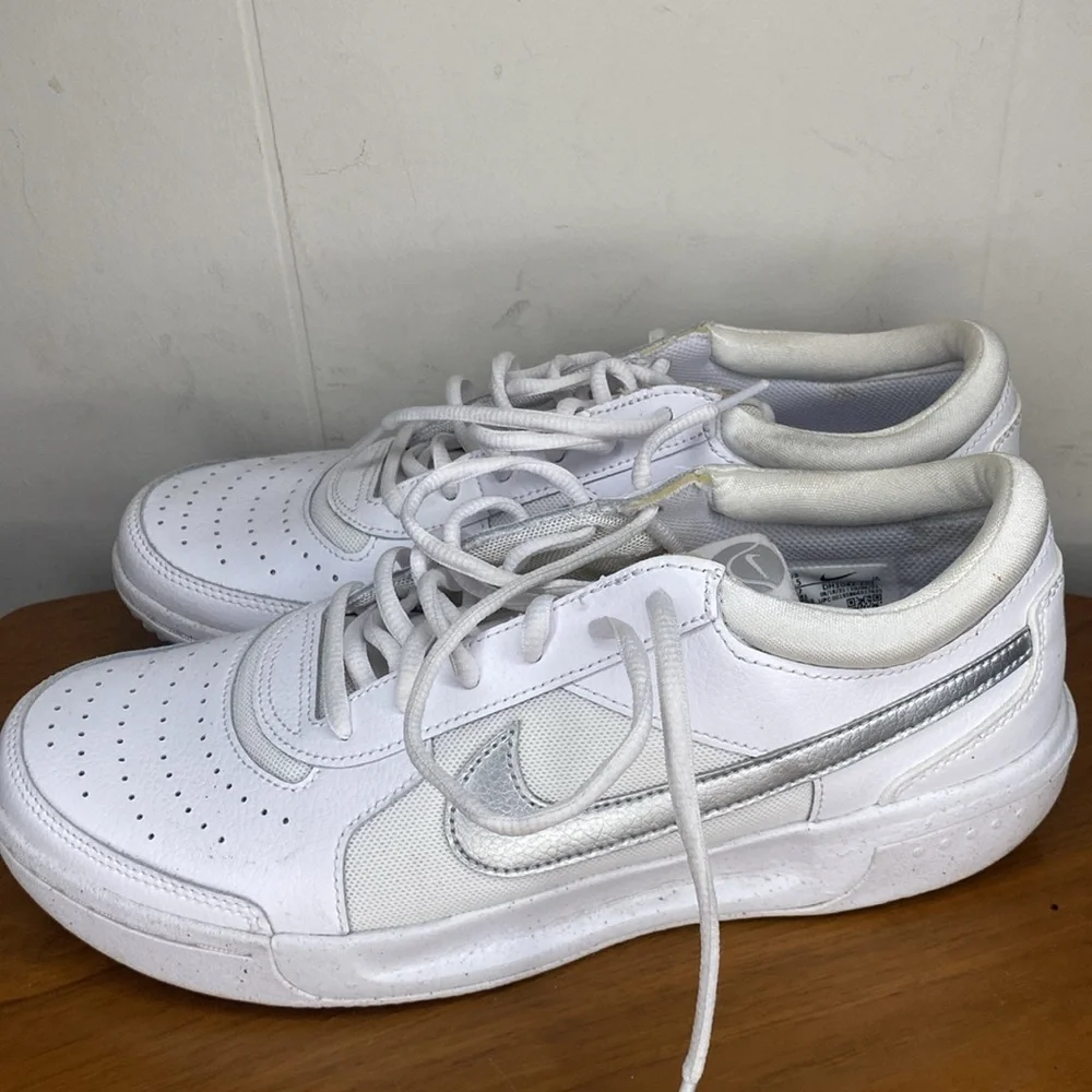 Nike White Sneakers with Silver Swoosh